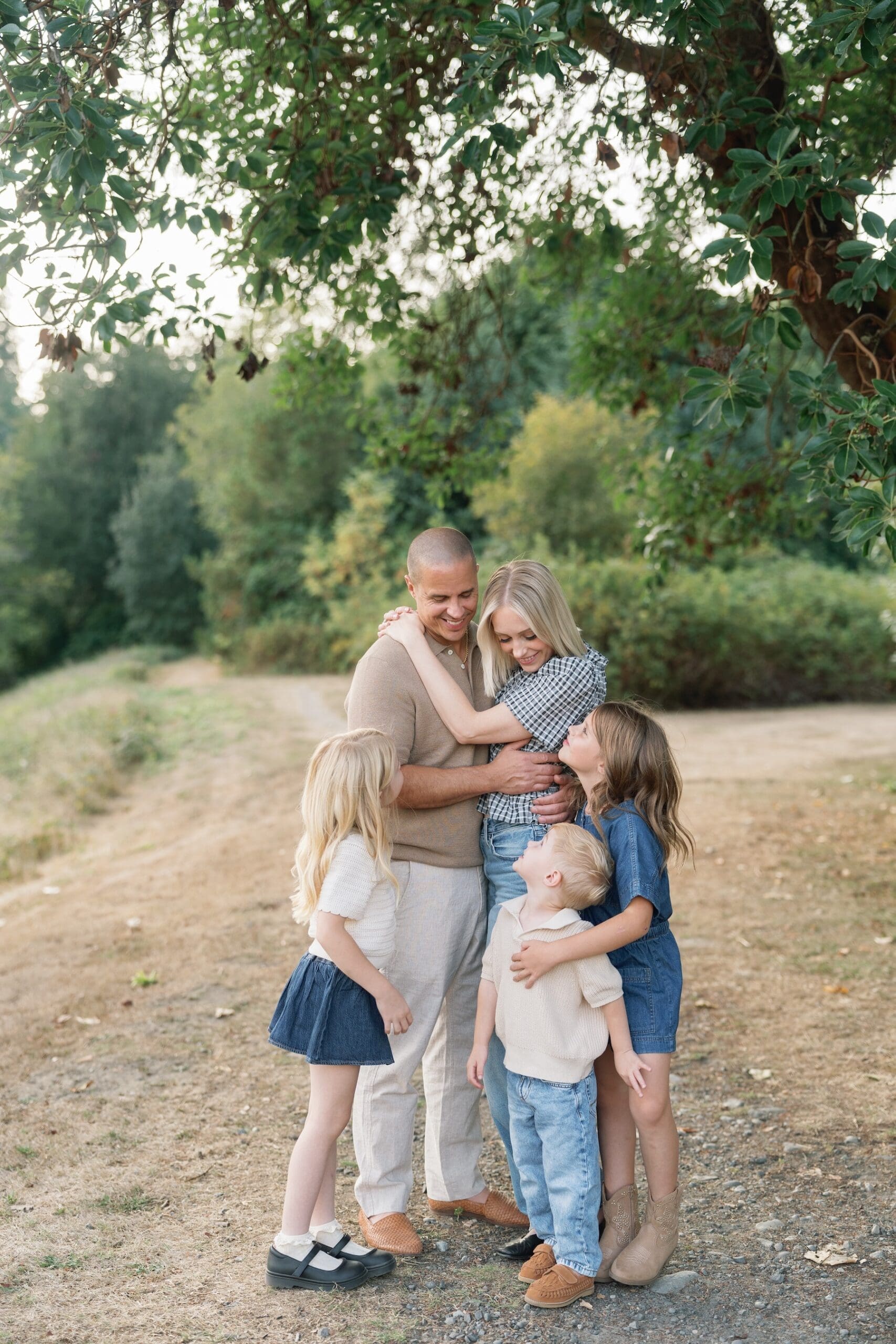 family hugging during family photo shoot at Marymooor Park 
