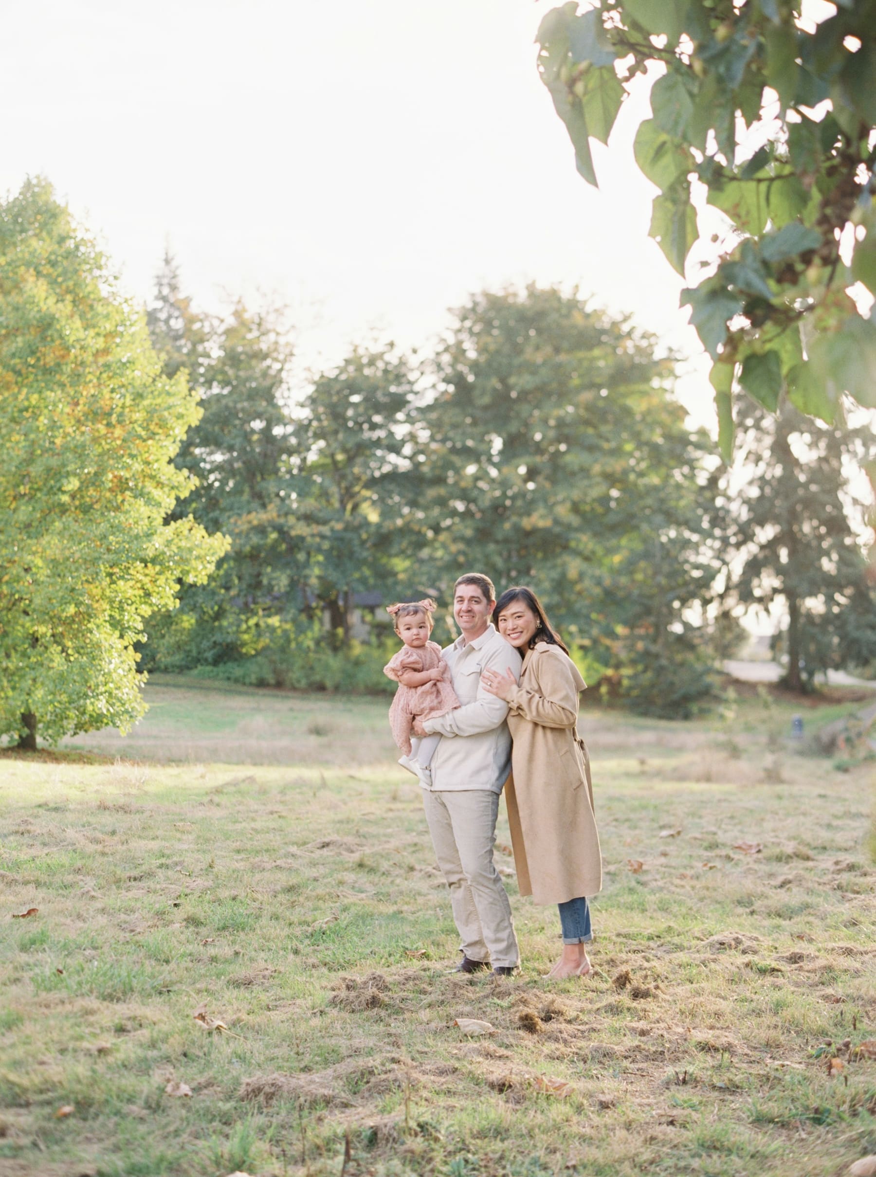 Kirkland family photography: Adorable baby girl in pink dress at Juanita Bay Park. Natural light, portrait.