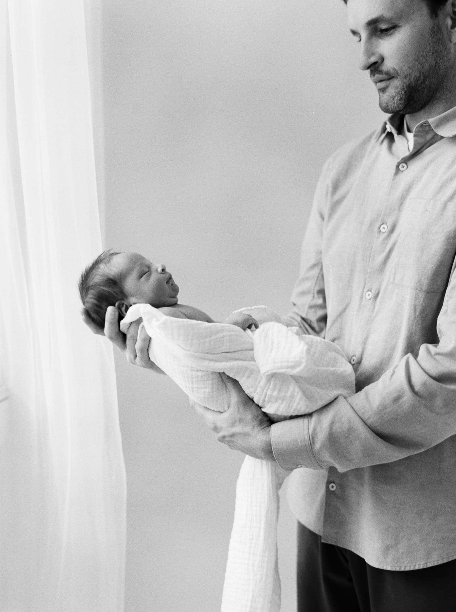 black and white film photo of Marshall's Seattle Newborn Pictures