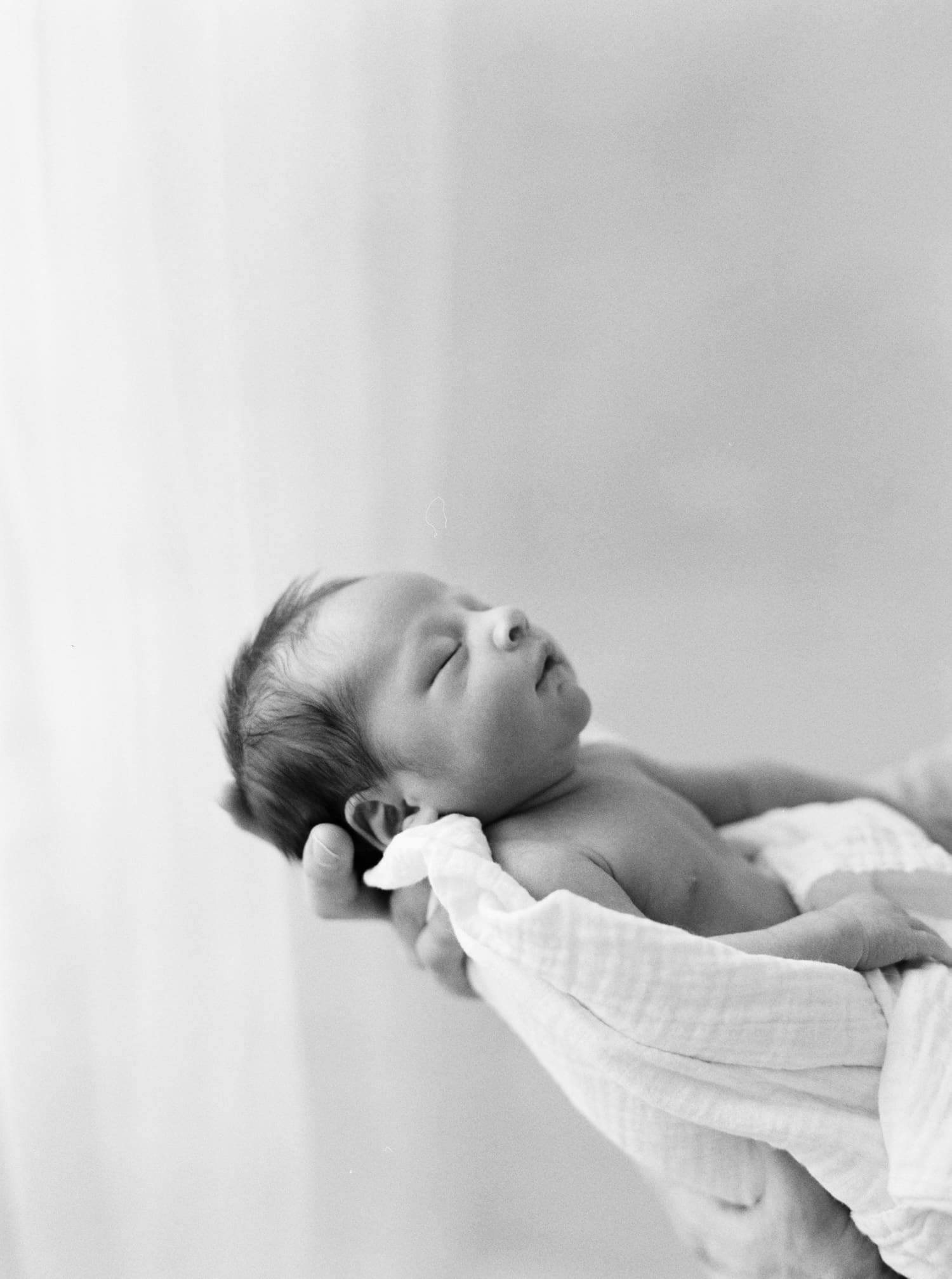 Seattle newborn pictures of baby Marshall on black and white film